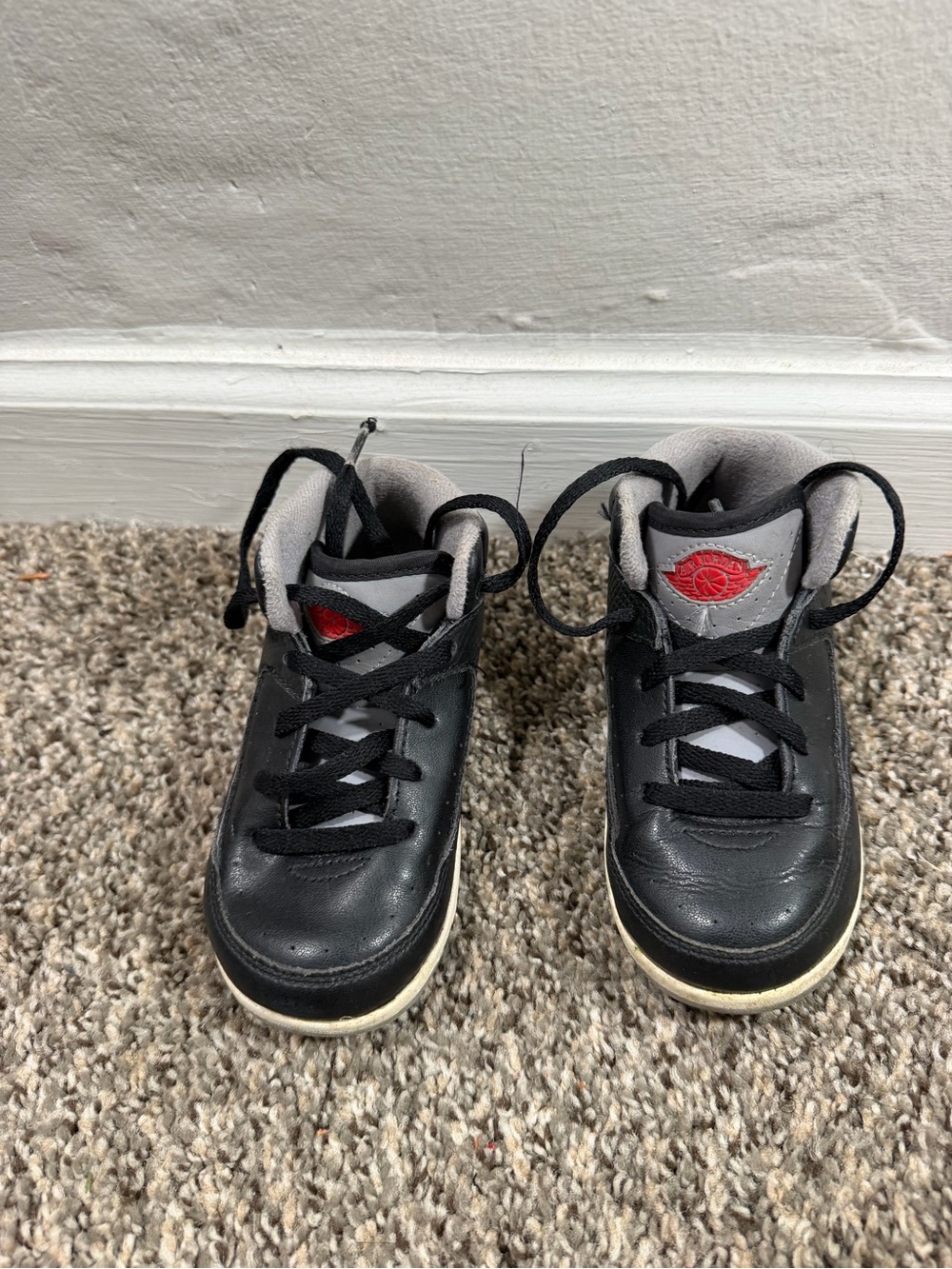 Jordan Kids Black and Gray High-Top Sneakers with Red Logo